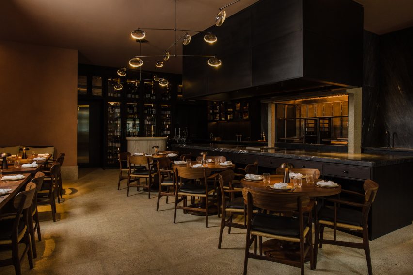 Wooden tables and chairs in Porto restaurant