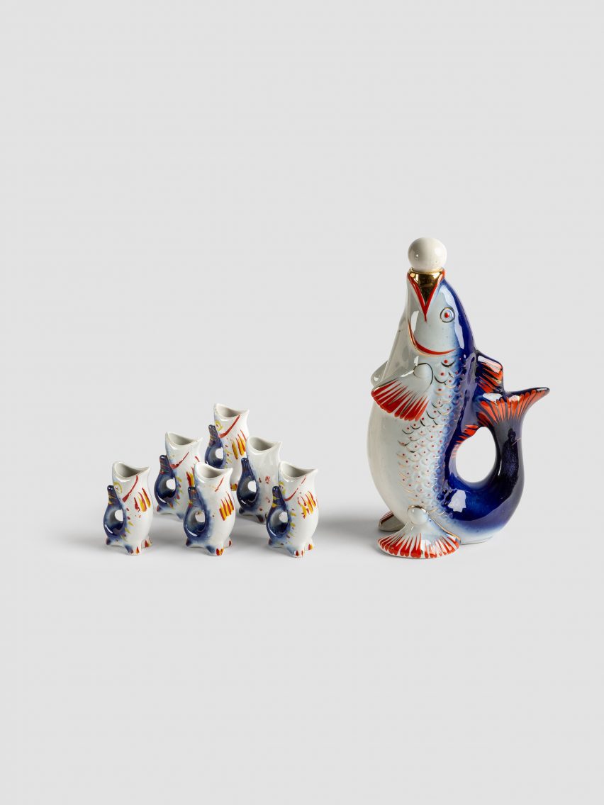Fish statue with smaller fish