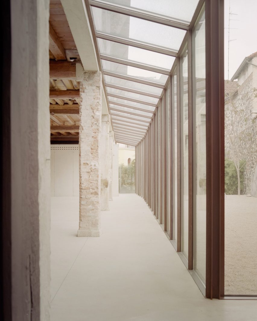 Interior of Threshold and Treasure art gallery in Italy by AMAA