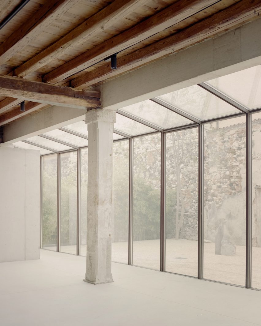 Interior of Threshold and Treasure art gallery in Italy by AMAA