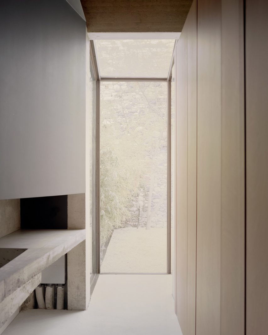 Interior of Threshold and Treasure art gallery in Italy by AMAA