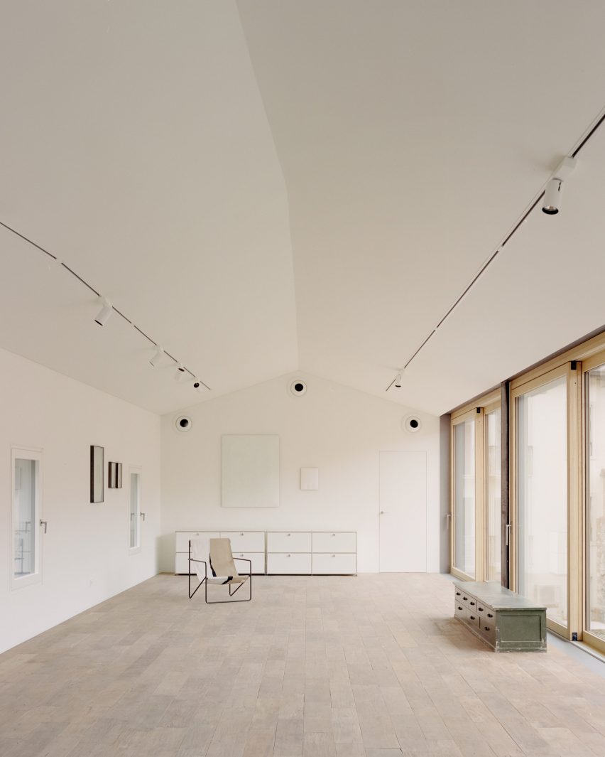 Interior of Threshold and Treasure art gallery in Italy by AMAA
