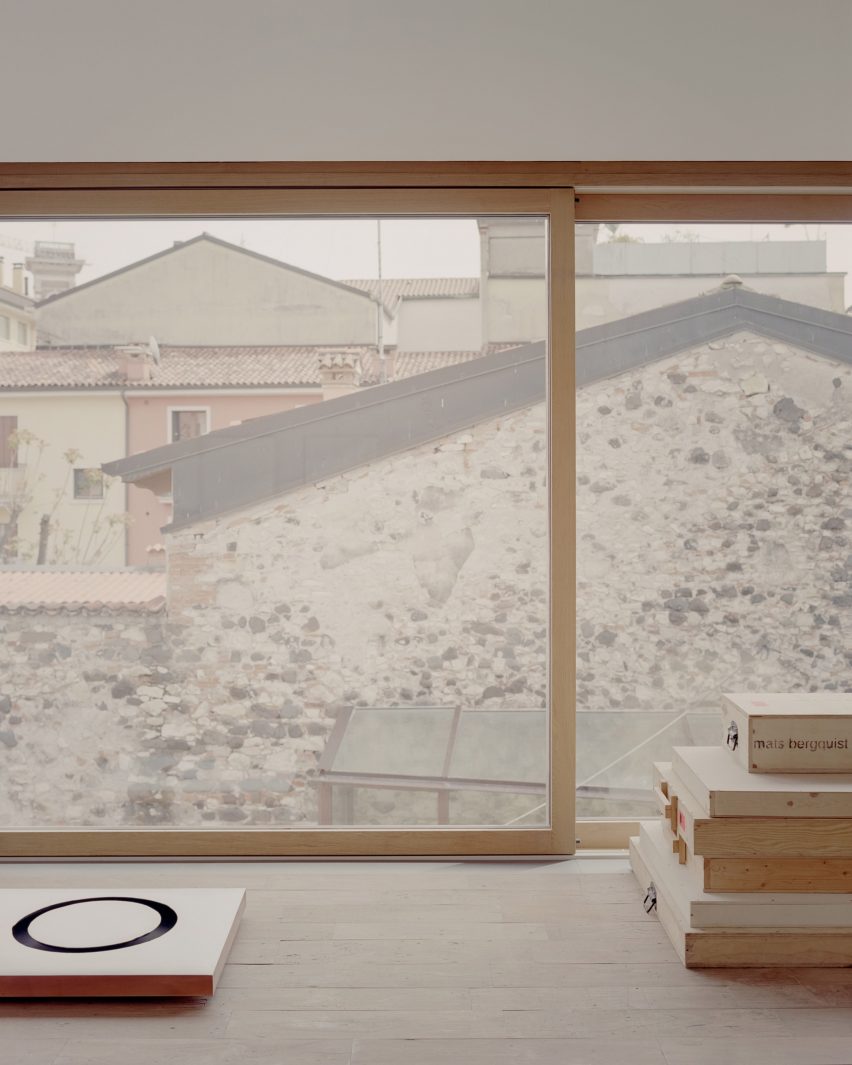 Interior of Threshold and Treasure art gallery in Italy by AMAA