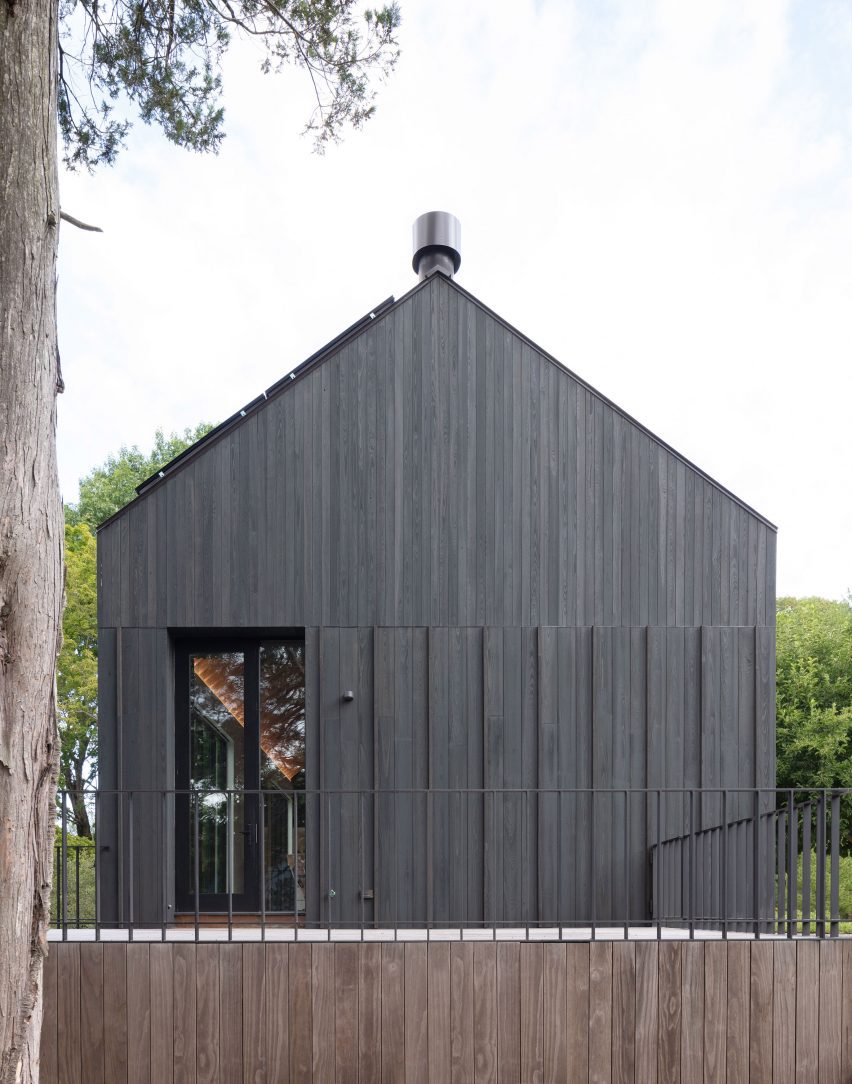Gable end of a black timber home