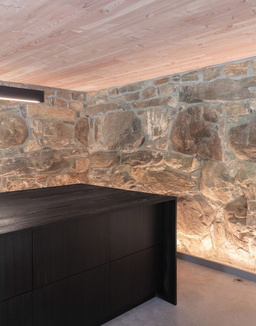 Basement with stone walls at the New York farmhouse by Worrell Yeung