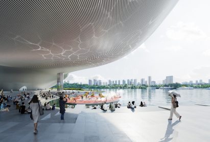 Outdoor space beside public building by Open Architecture