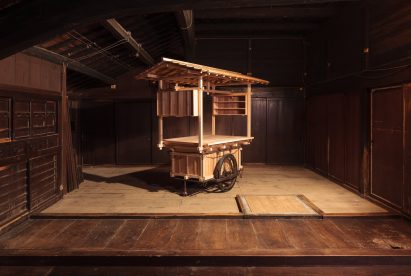 Wooden cart in industrial interior setting