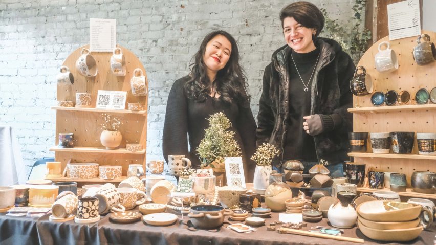 Photo of two people at a market stall part of Fad Market
