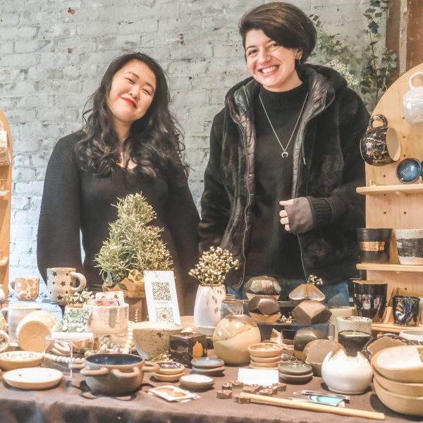 Photo of two people at a market stall part of Fad Market
