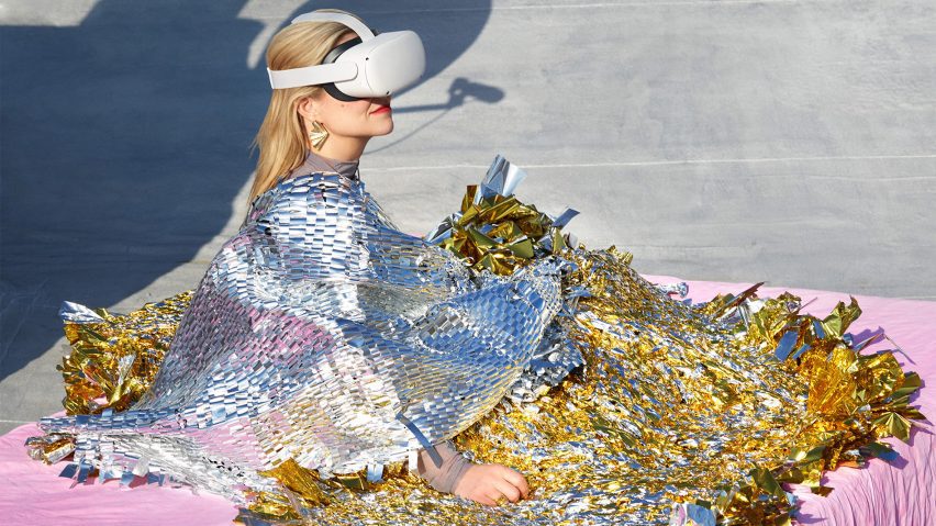 Photo of a person in foil blankets wearing a VR headset
