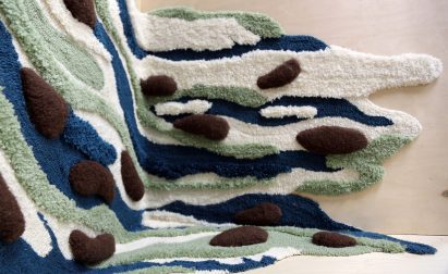 Brown, green and navy coloured textile