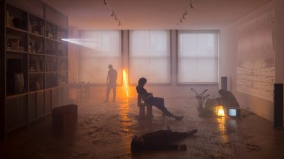 Dark room illuminated by projector and neon lights