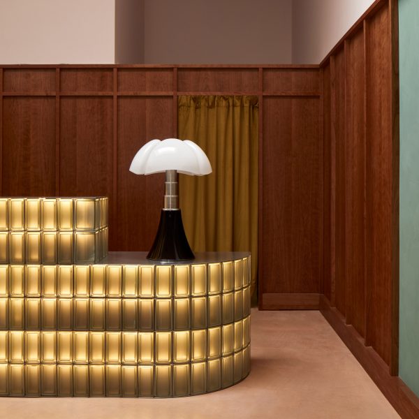 Glowing glass block counter with Gae Aulenti lamp
