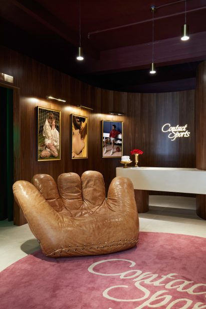 Jonathan de Pas baseball glove chair in front of counter