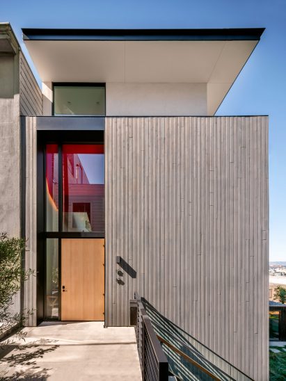 Exterior and back garden of Red Stair House by Dumican Mosey
