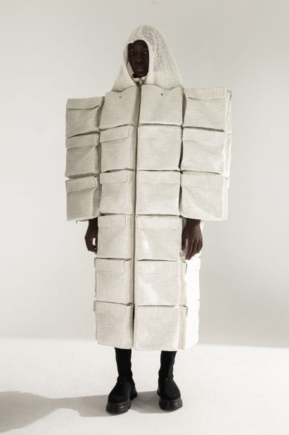 Oversized garment with multiple pockets by DZHUS
