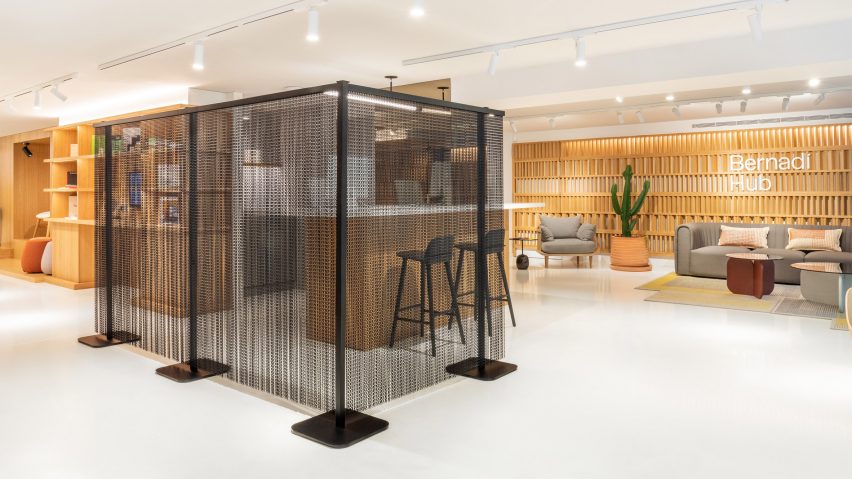 Feel Free chain curtain room divider by Kriskadecor in an office