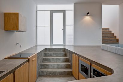 Sunken kitchen inside Flower House by Ezzo