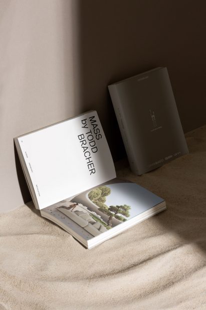 Photo of the Gandia Blasco Outdoor 2023 catalogue open to a page with big, bolg type reading Mass by Todd Bracher