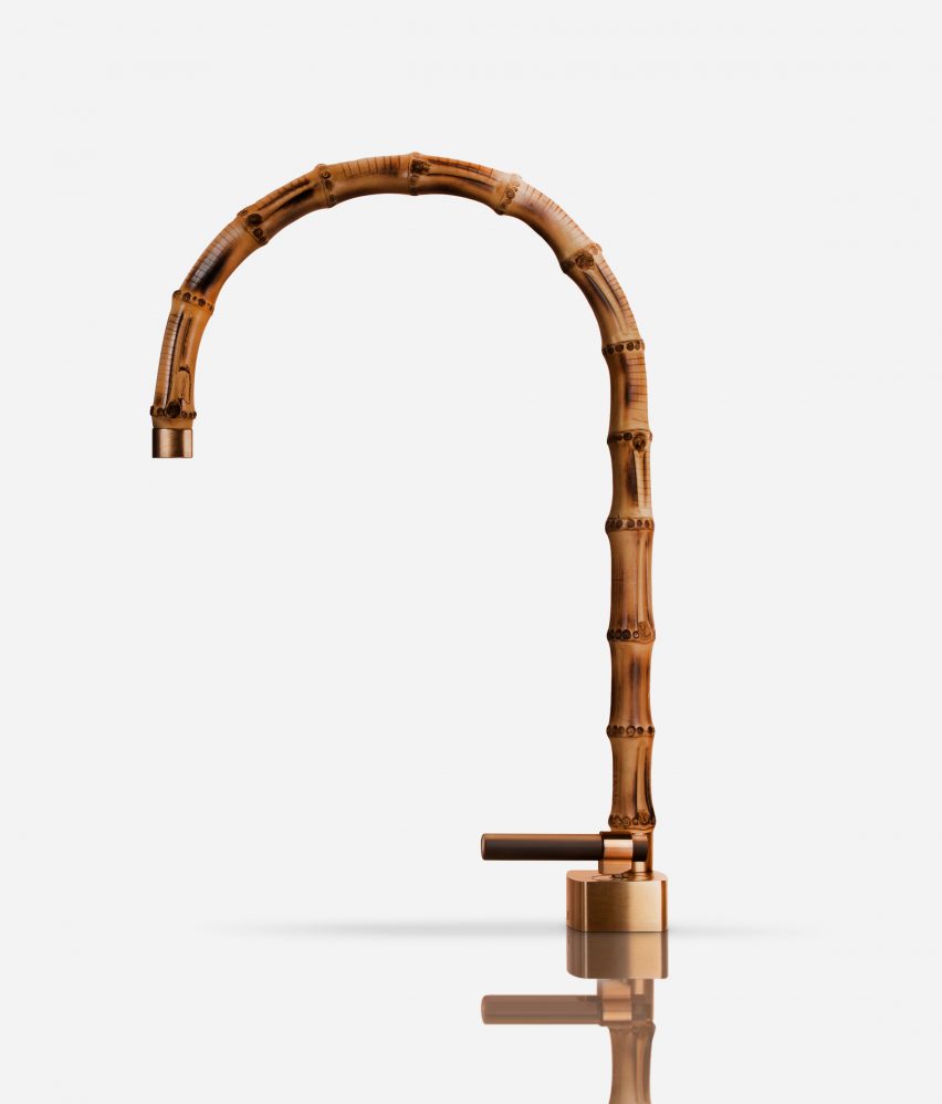 Curved tap made from bamboo on white background