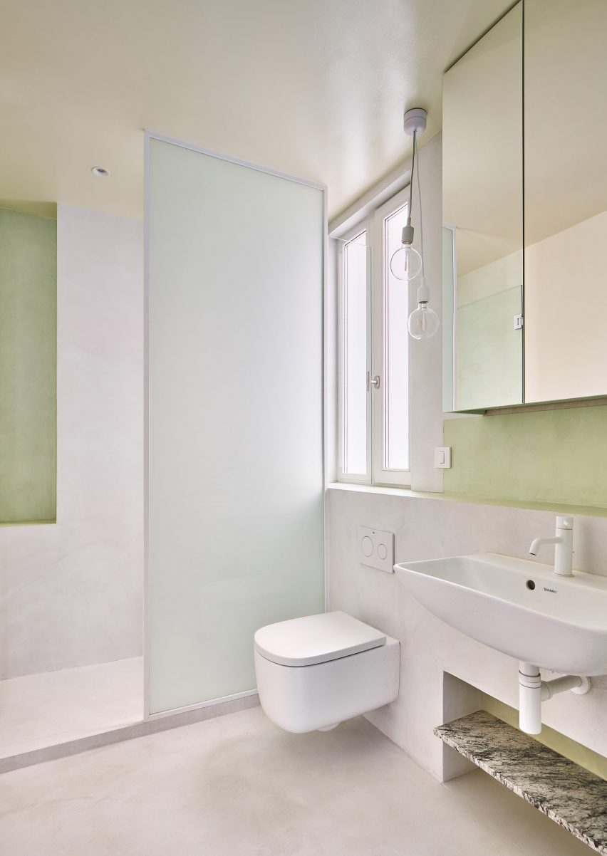 Bathroom interior of Girona Street apartment in Barcelona, designed by Raúl Sanchez Architects
