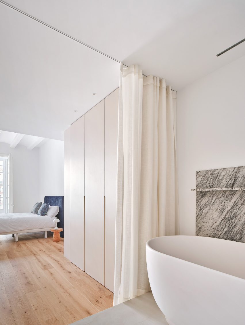 Bathroom interior of Girona Street apartment in Barcelona, designed by Raúl Sanchez Architects