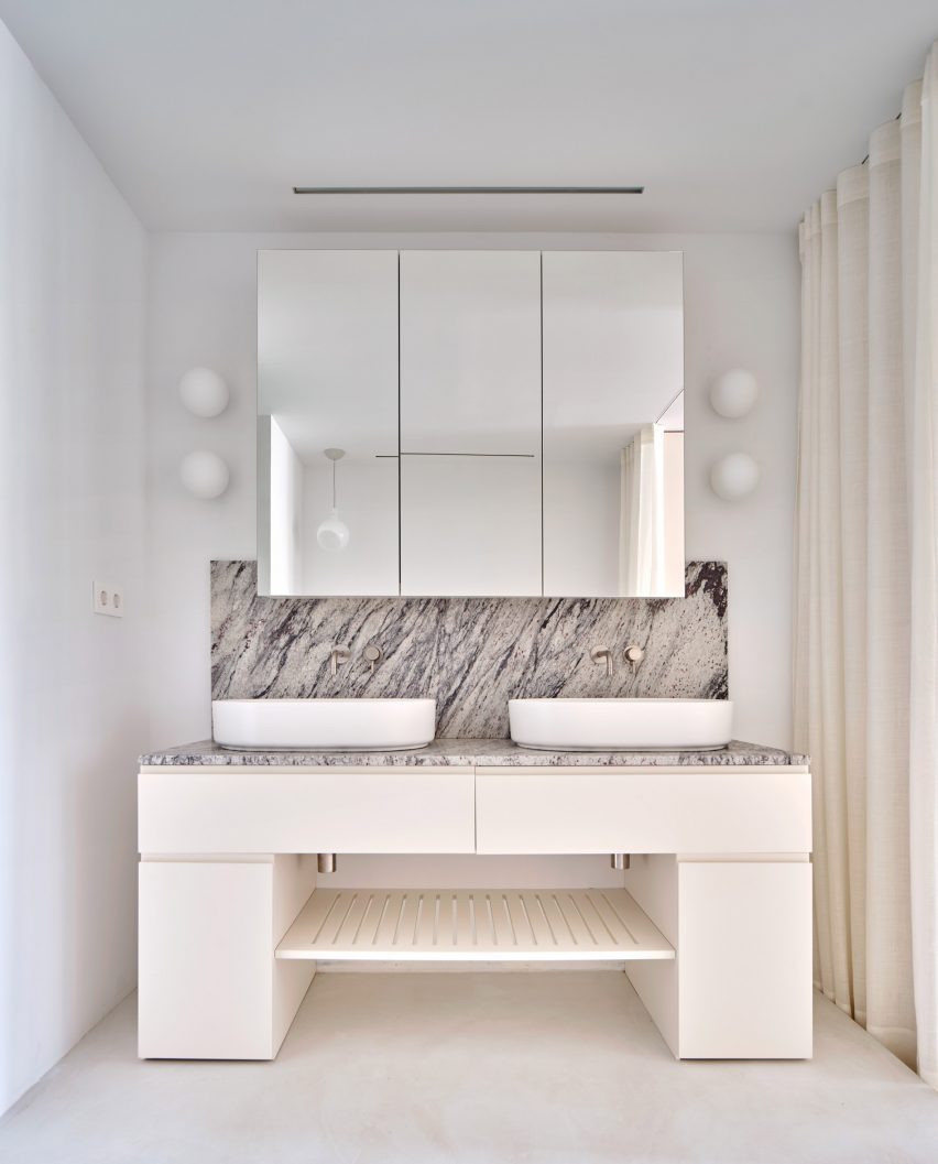 Bathroom interior of Girona Street apartment in Barcelona, designed by Raúl Sanchez Architects