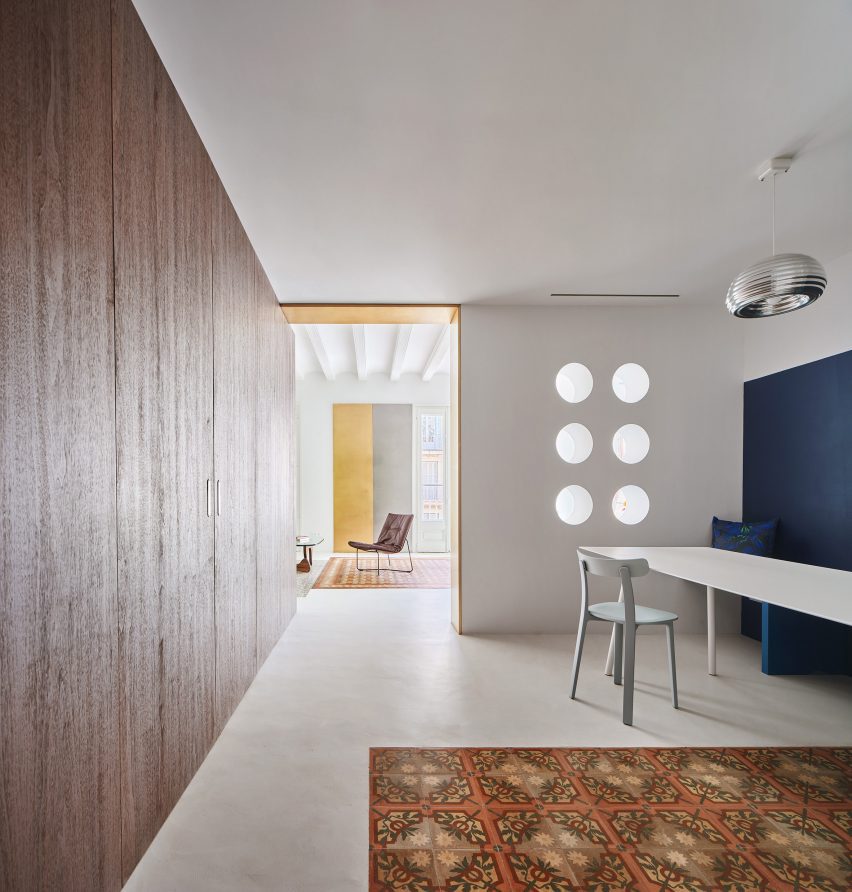 Dining room interior of Girona Street apartment in Barcelona, designed by Raúl Sanchez Architects