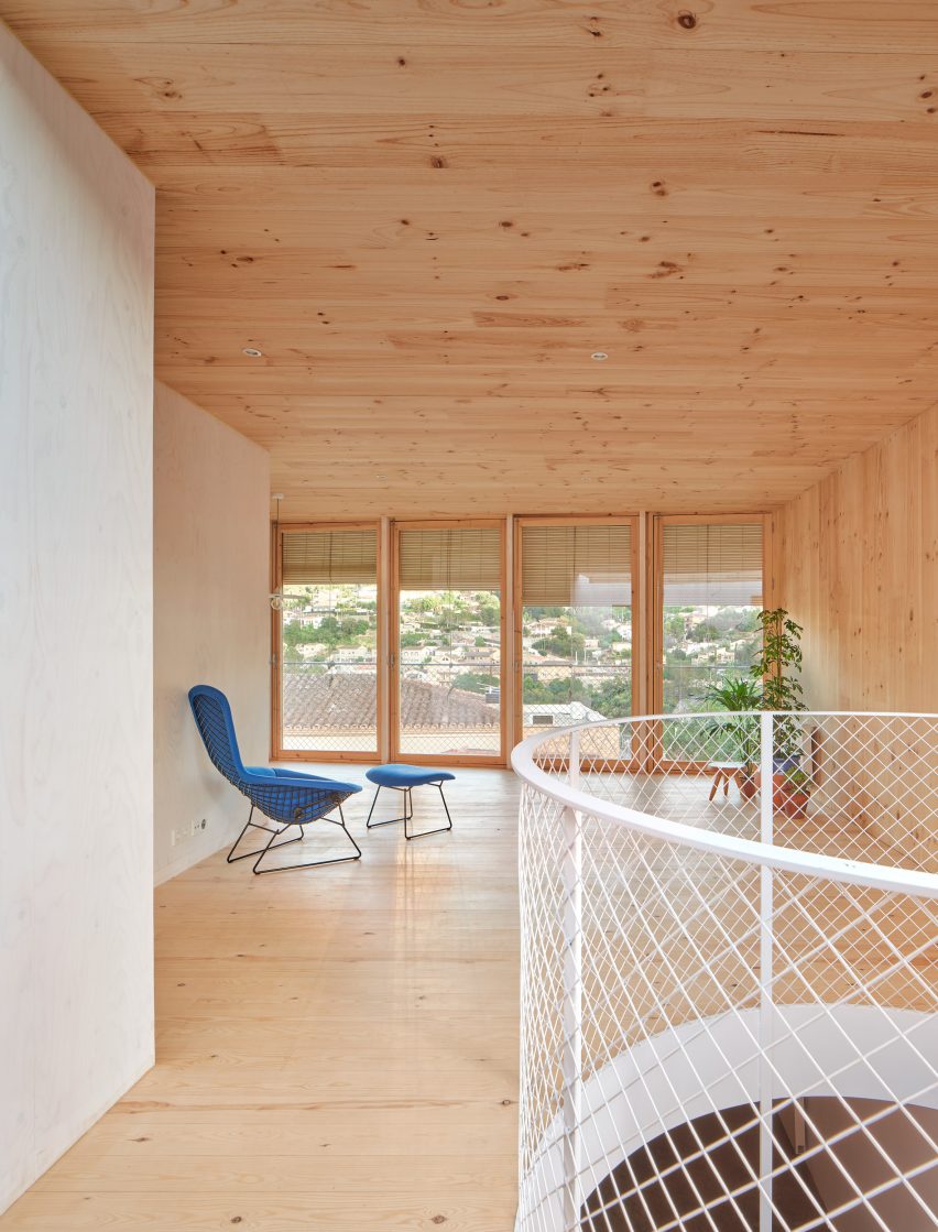 Interior of House on a Brick Base by Agora Arquitectura