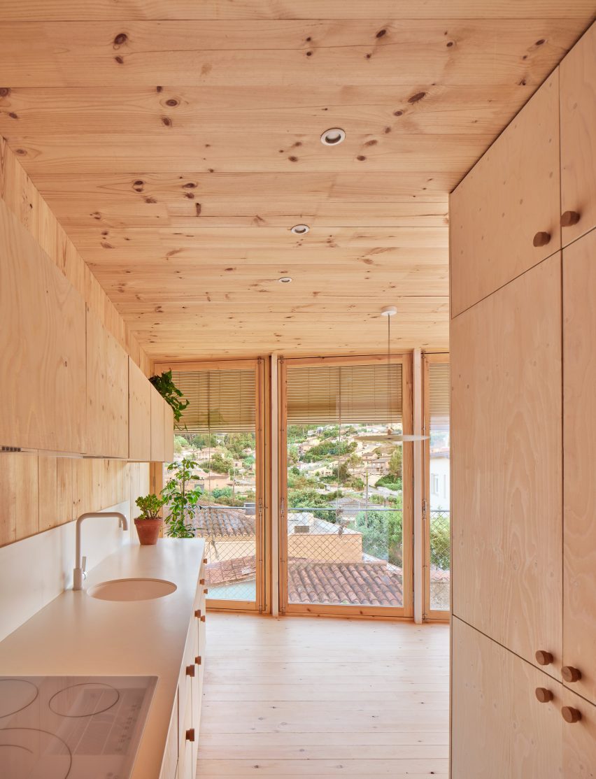 Interior of House on a Brick Base by Agora Arquitectura