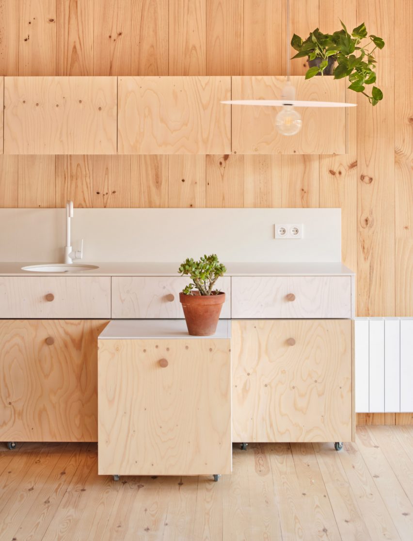 Interior of House on a Brick Base by Agora Arquitectura