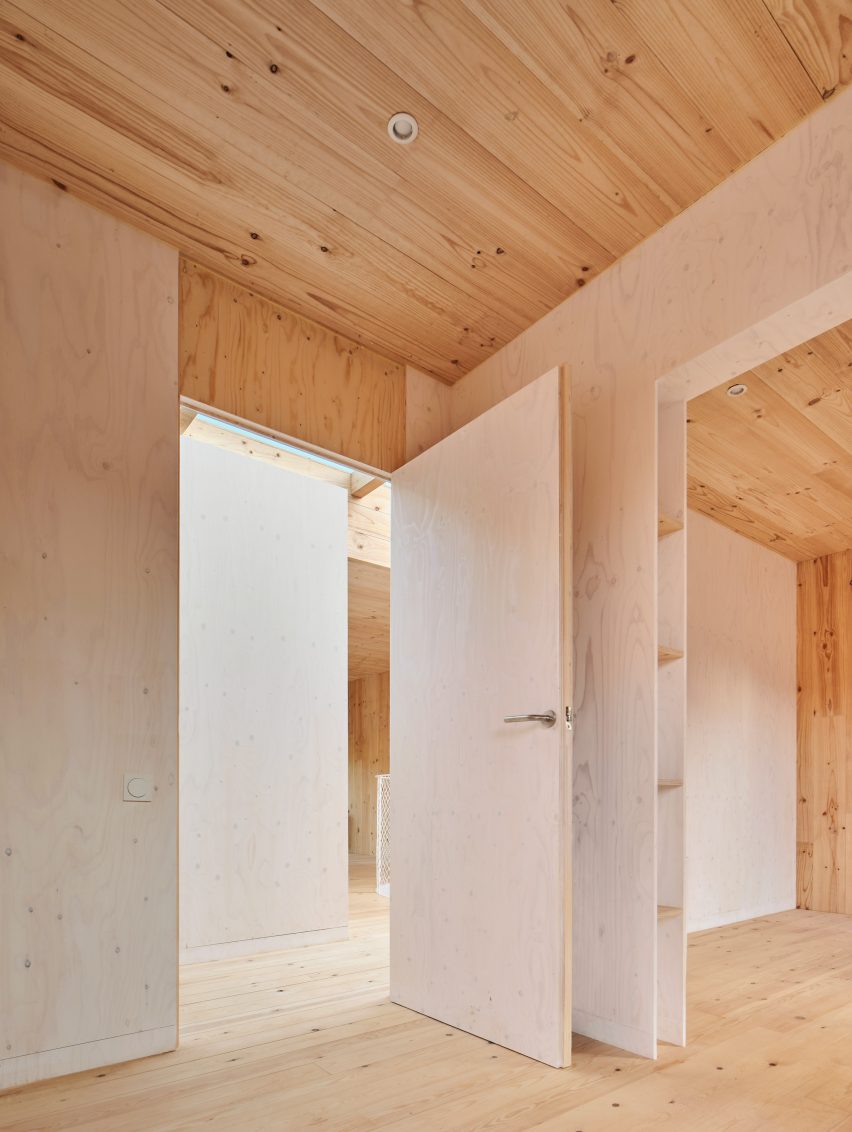 Interior of House on a Brick Base by Agora Arquitectura