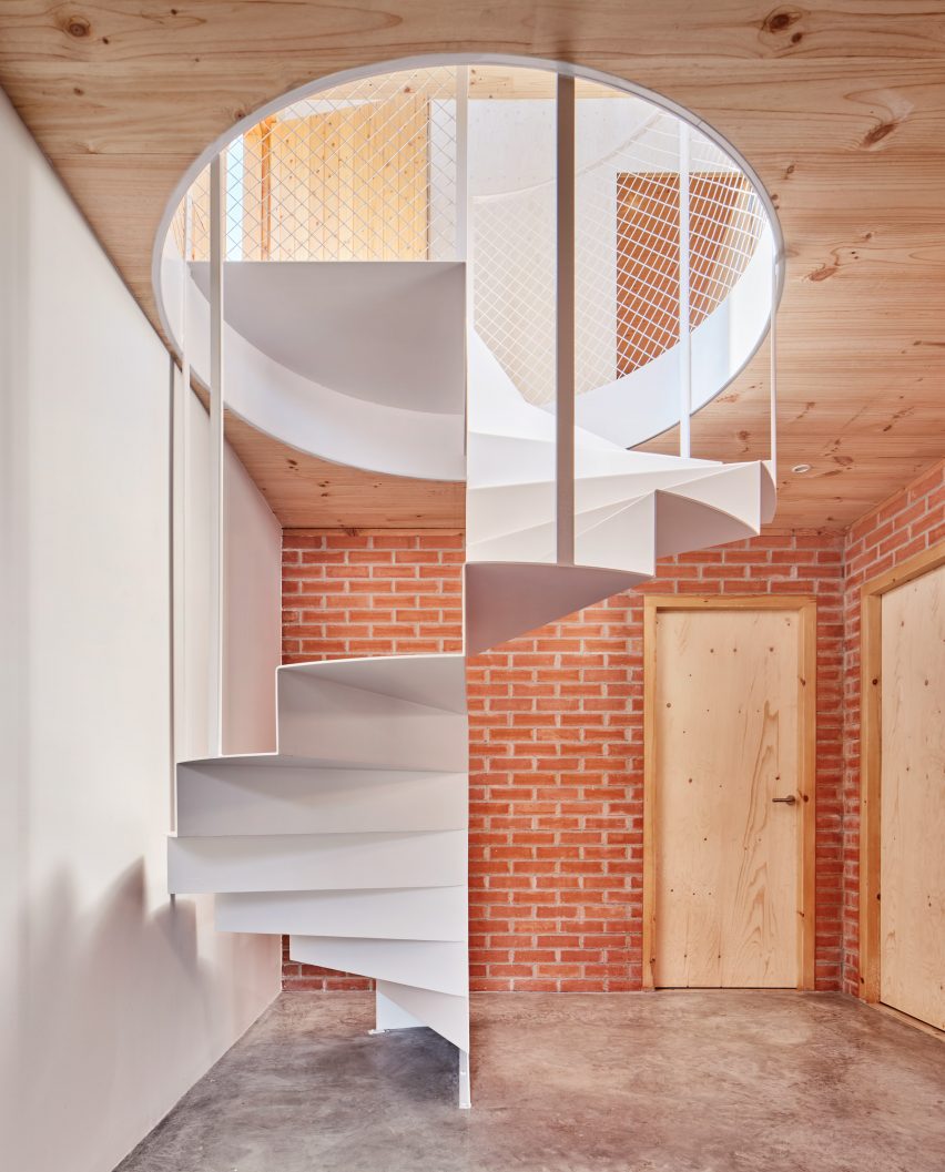 Interior of House on a Brick Base by Agora Arquitectura