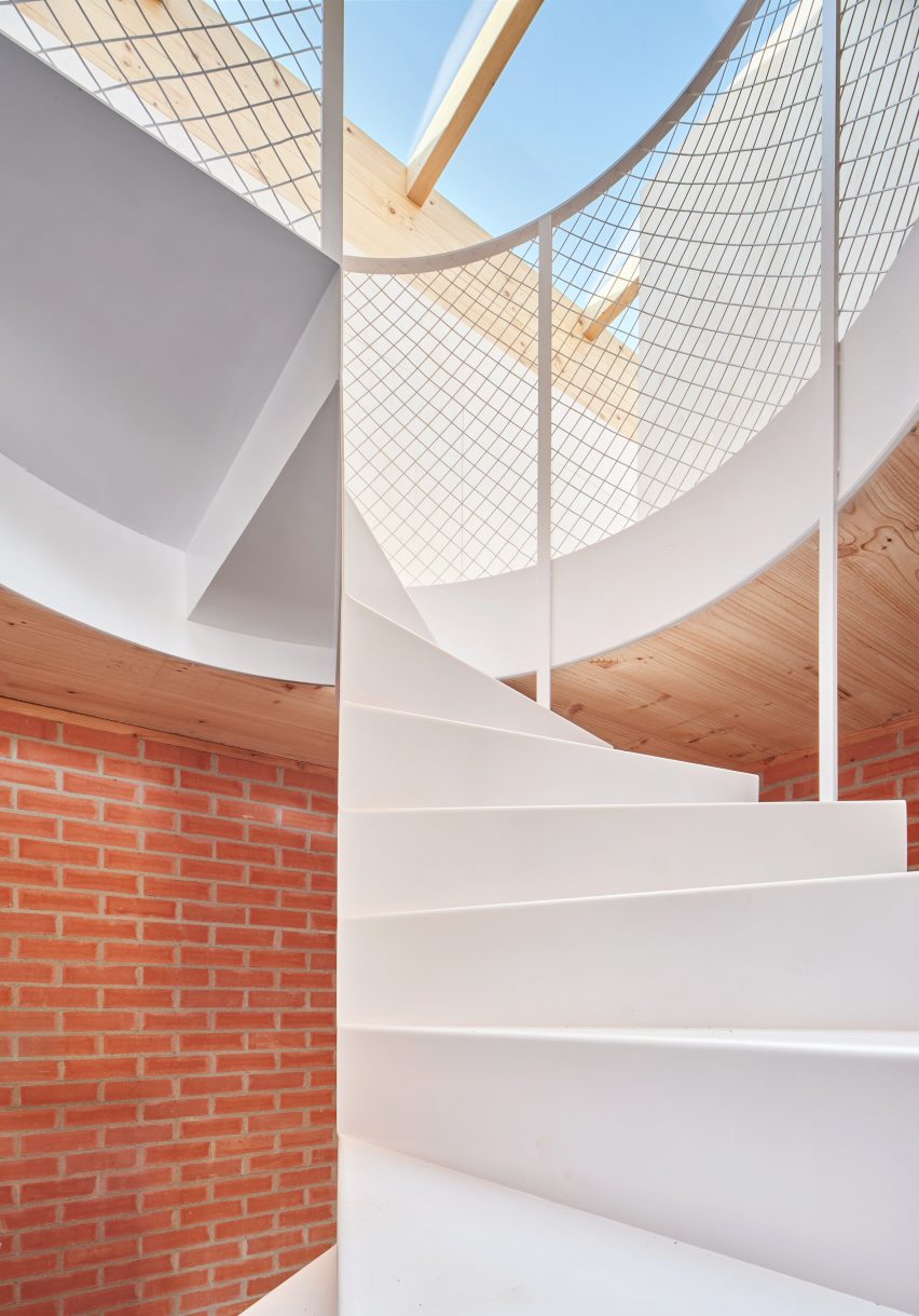 Interior of House on a Brick Base by Agora Arquitectura