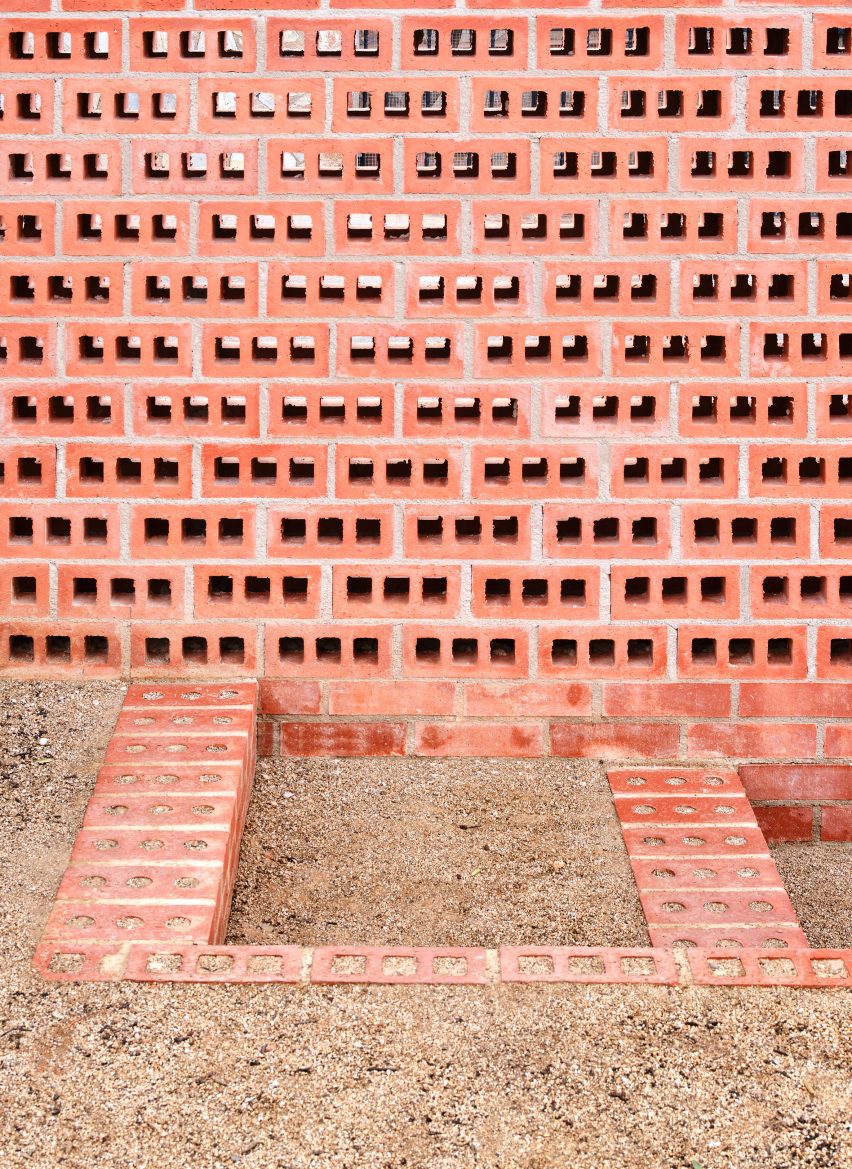 Exterior of House on a Brick Base by Agora Arquitectura