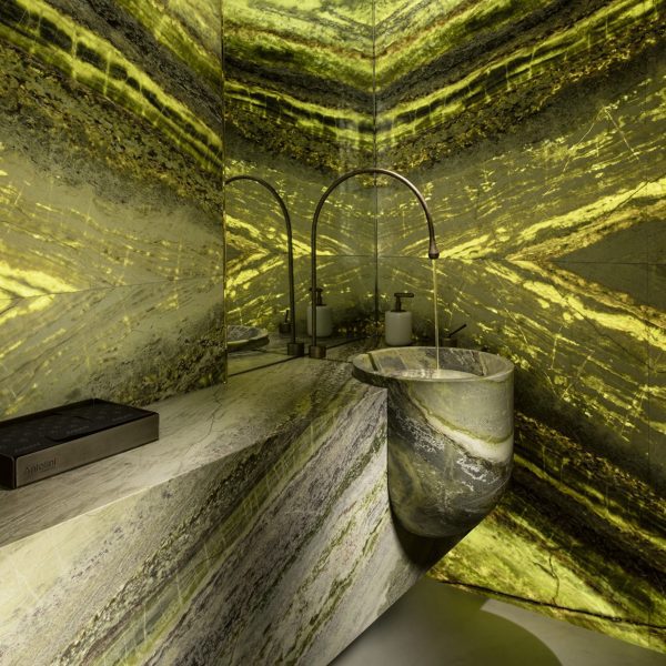Irish Green marble by Antolini used on bathroom walls, sink and vanity unit