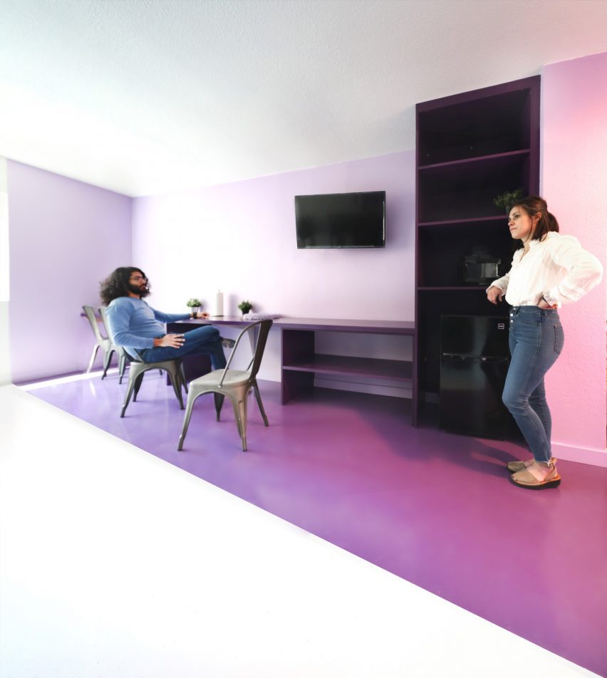 Purple and white meeting space at The Alvarado by Kadre Architects