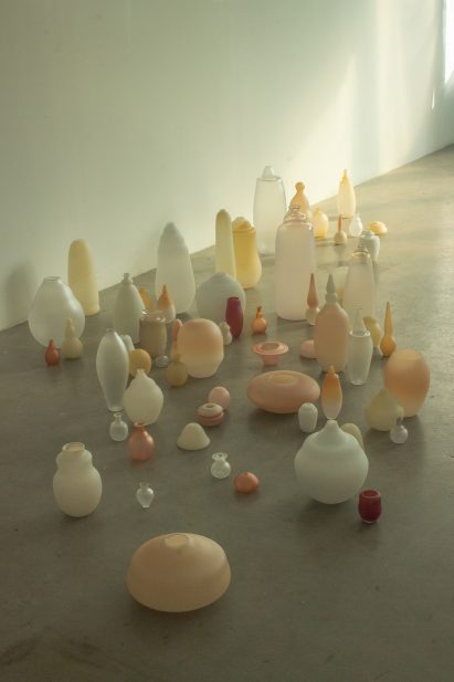 Pale pastel ceramics on concrete floor