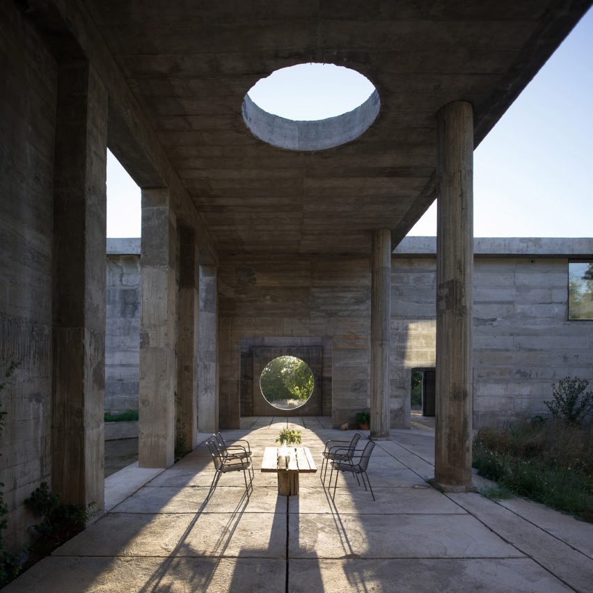 Cloister with circular skylight in Luna House by Pezo von Ellrichshausen
