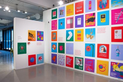 Gallery with walls covered in colourful artwork