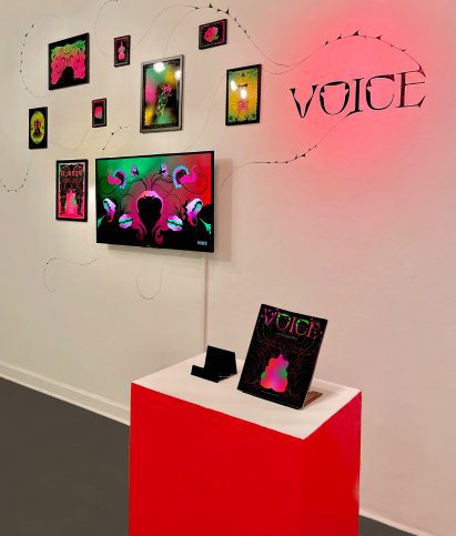Gallery space with plinth and frames on wall