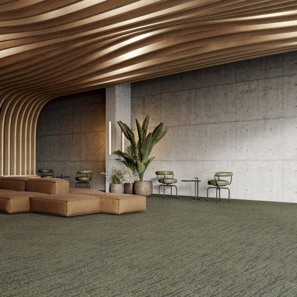 Large room with wooden wavy ceiling and green carpet tiles
