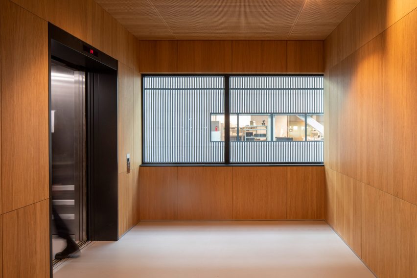 A room with wood-panelled walls
