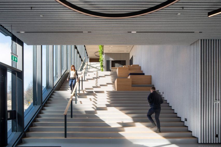 Wide staircase with grey walls and glazed external wall