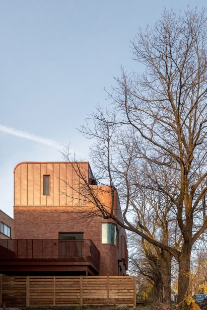 Sunlight on top of red brick building in Montreal