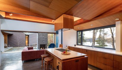 Wood-wrapped kitchen within Nebo House