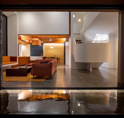 Polished concrete floors within living room of Nebo House by Fuller Overby