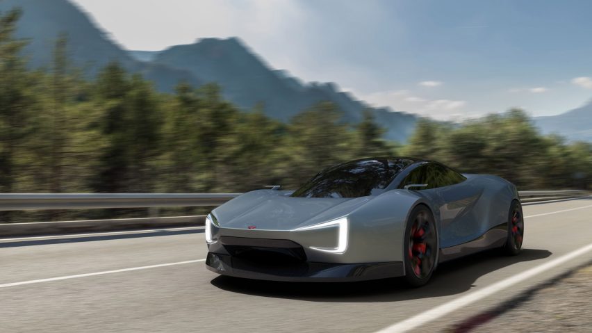 Sleek car driving on road