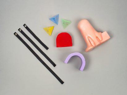 Colourful objects laid out on table