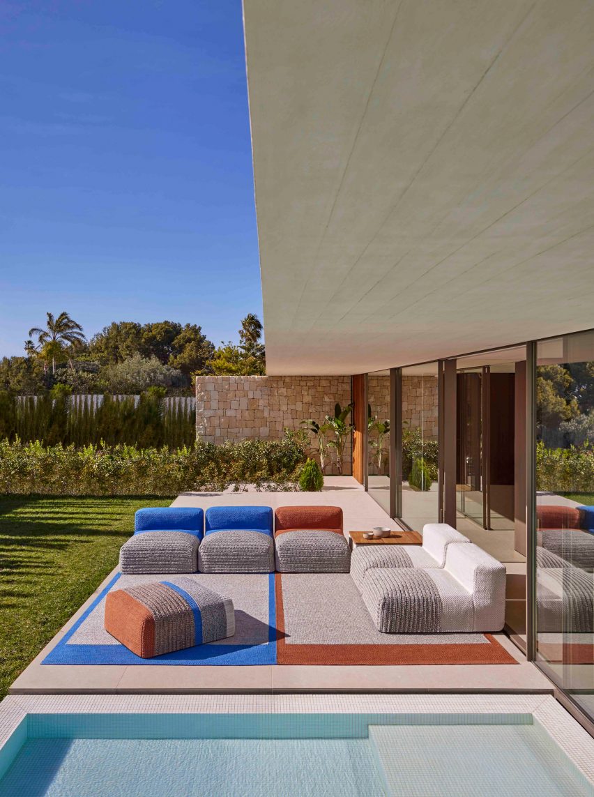 Colourful seating and rugs outdoors